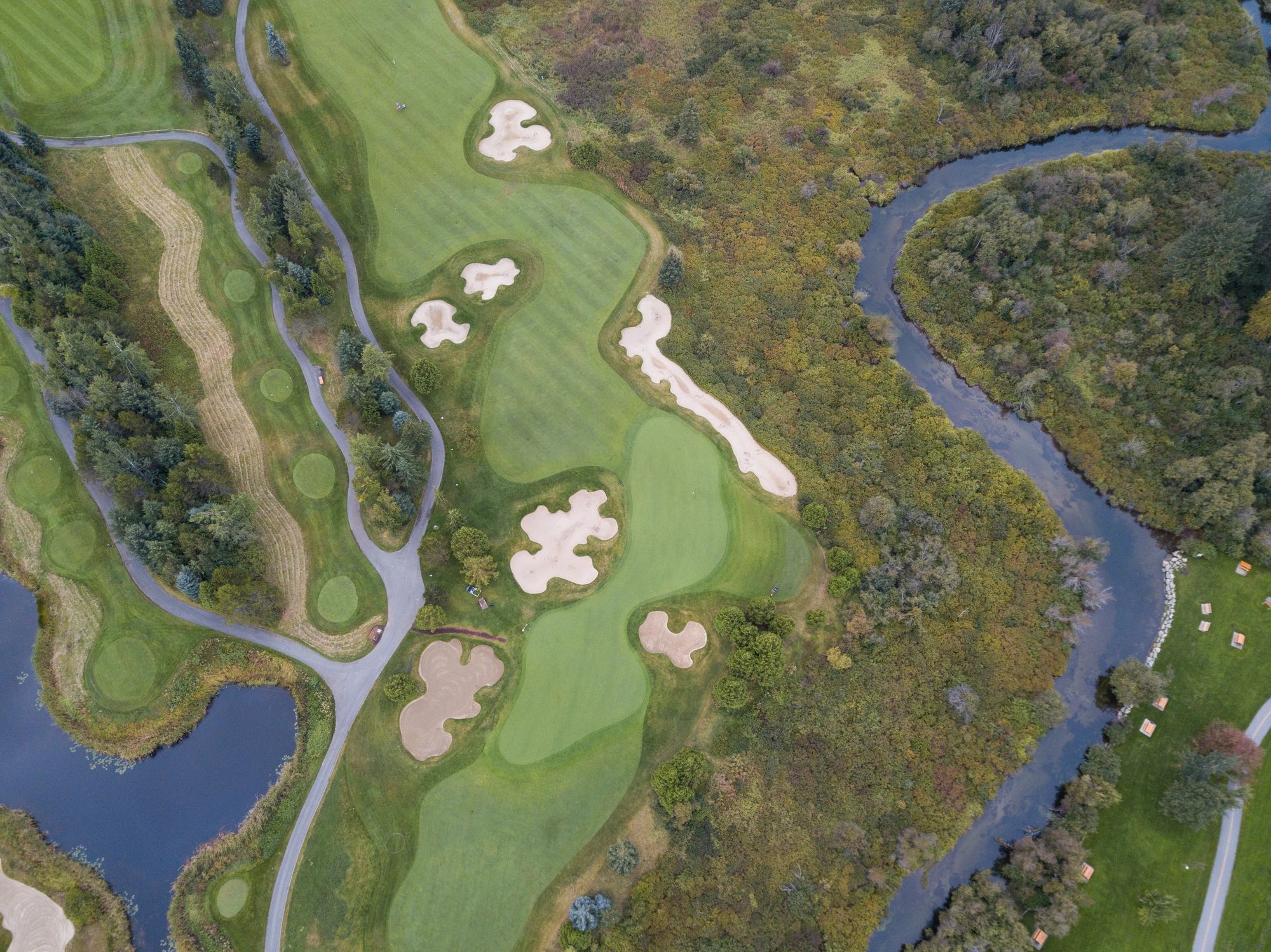 Daytime view of a golf course from above